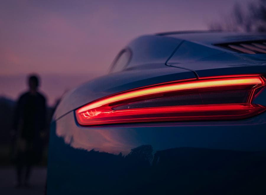 Tail lamp of a car in a sunset scenery Tail lamp of a car in a sunset scenery